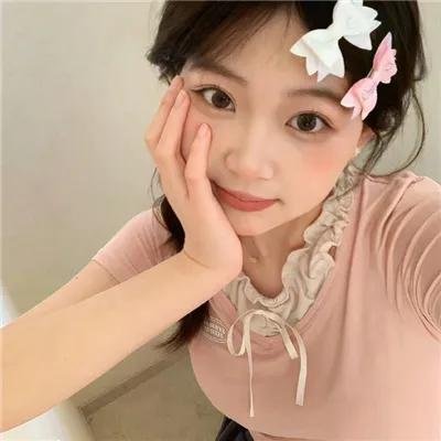 彼女